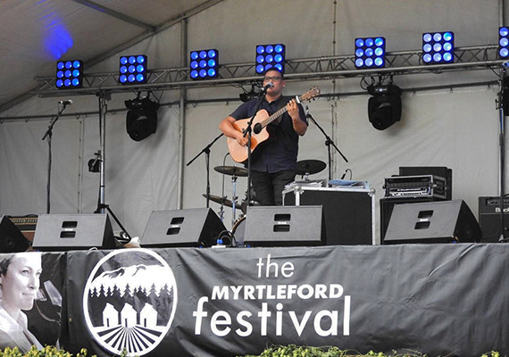 On stage for a live performance at the Myrtleford Festival.
